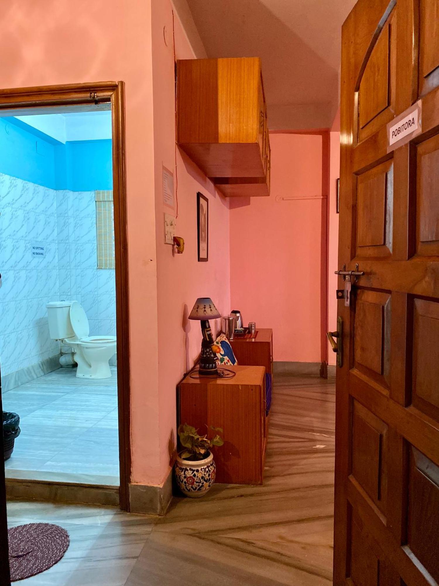 Assam Home Hostel Project Ґувахаті Номер фото